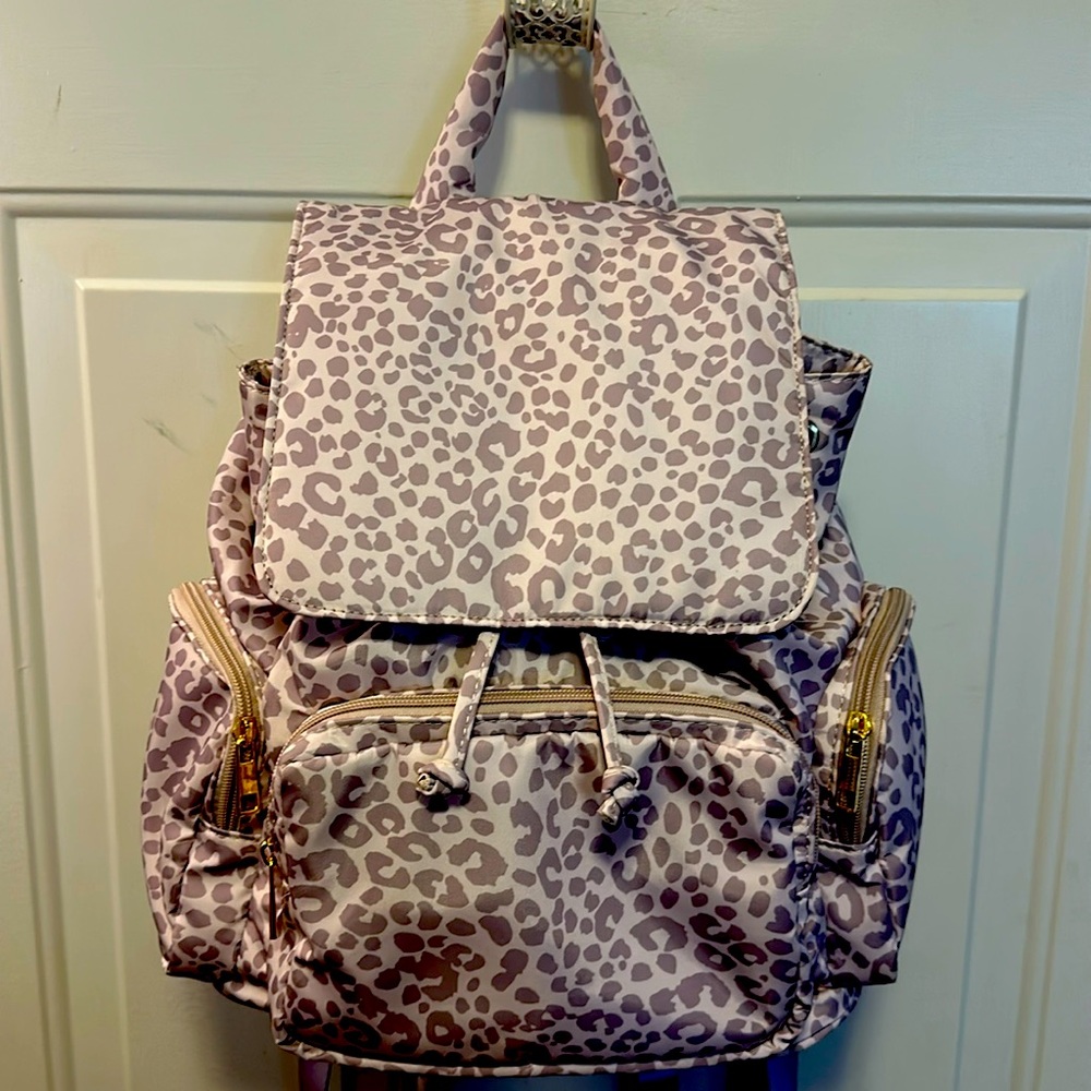 Justfab Puffy Nylon Multi Zipper Pocket Backpack animal print lavender